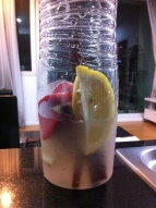 Lemon, lime, cinnamon, a couple of strawberries and a splash of coconut water. Top up with water and leave overnight.